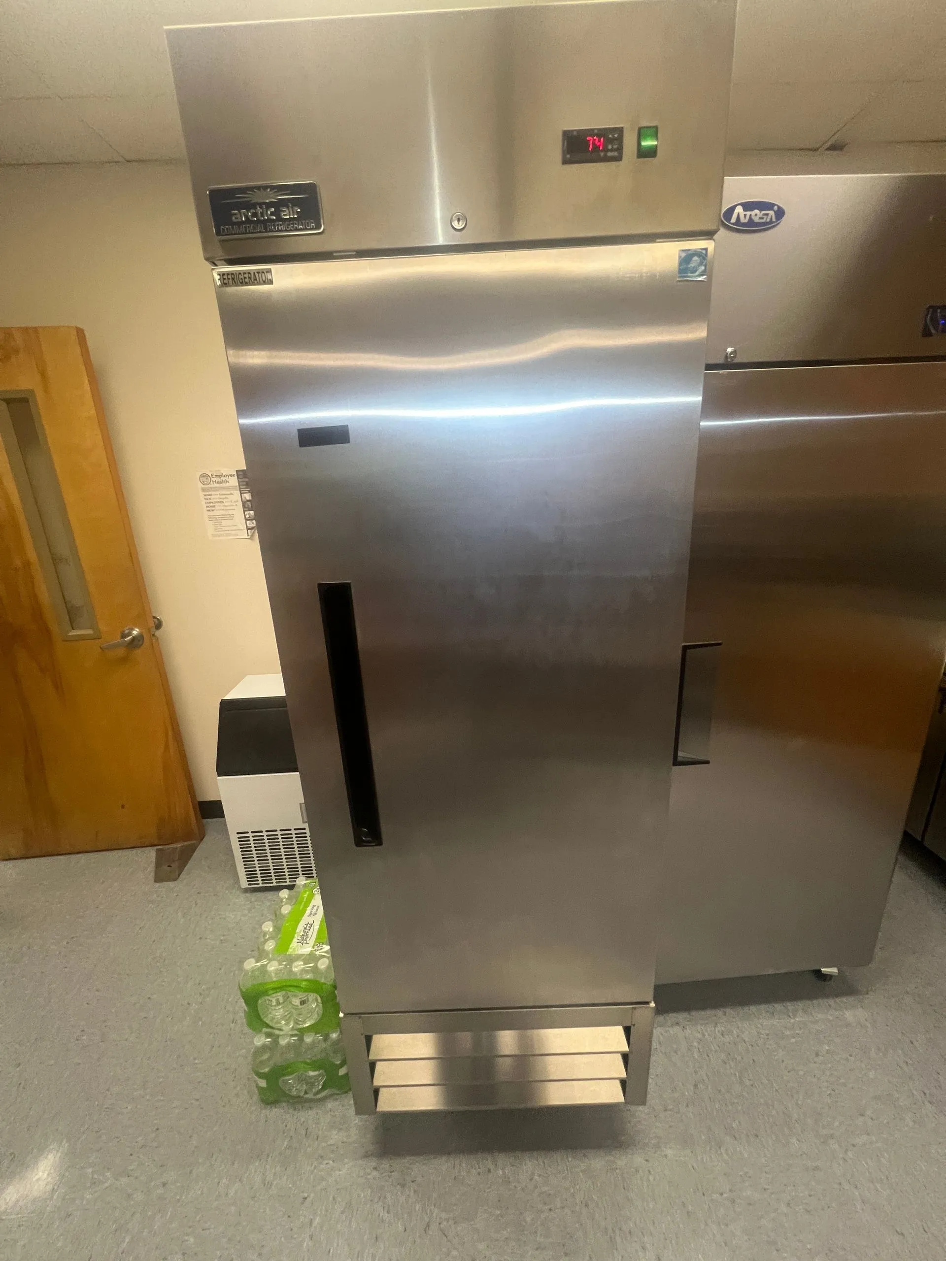 Row of stainless steel commercial reach-in coolers